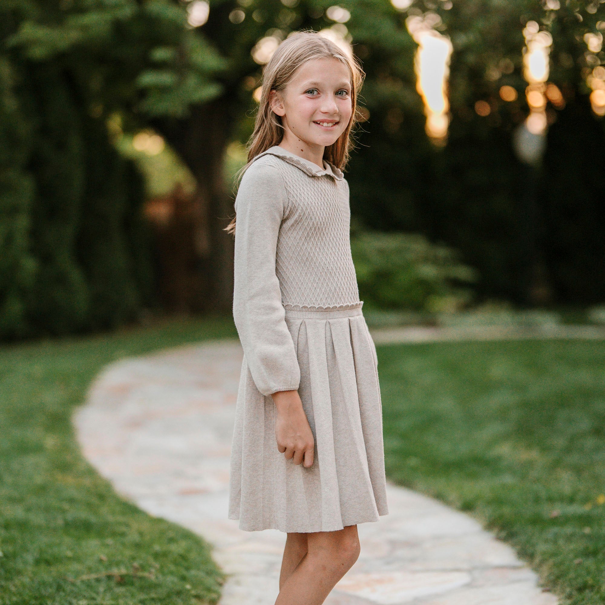 knit dress with collar Black Collared by Alexia Admor 28% Polyester Unlined Hand Wash Cold Manufactured in China Designed in The USA Model is 58 and Wearing a Size X Oatmeal Collar Midi Knit Dress